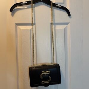 Express Black Crossbody with Gold Chain and Snake Accent